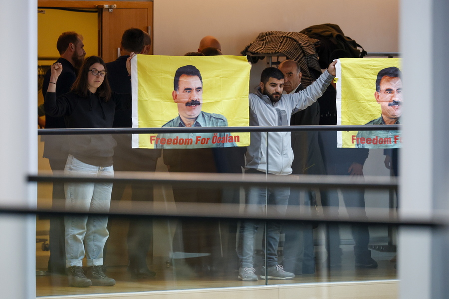 epa10468019 Kurdish activists followers of jailed Kurdistan Workers' Party (PKK) leader Abdullah Ocalan are escorted after a demonstration during a session at the European Parliament in Strasbourg, France, 15 February 2023.  EPA/JULIEN WARNAND