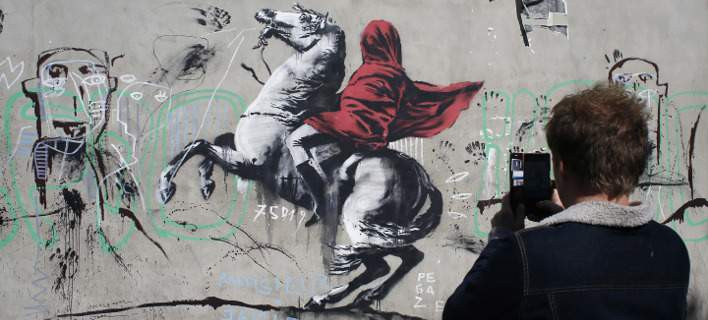 Ένας Παριζιάνικος καταυλισμός προσφύγων μεταμορφώνεται με έργα του Banksy
